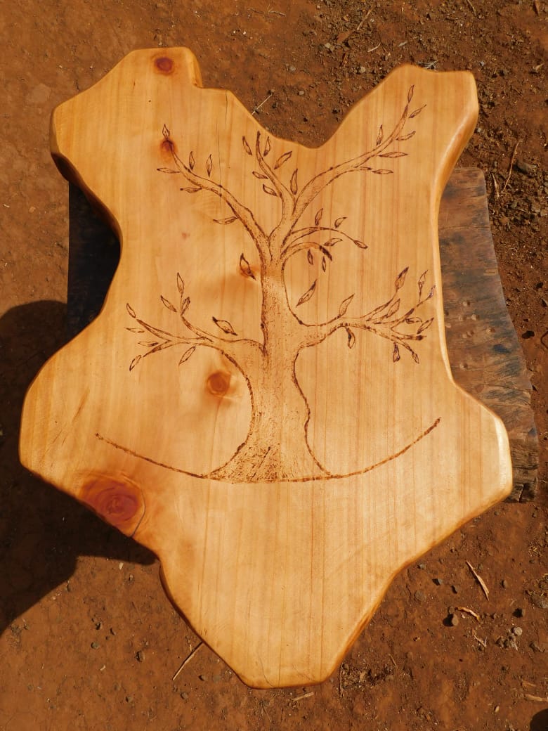 Artisan Kenya shaped African Cypress Cutting board