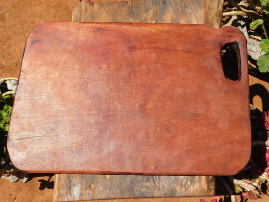 Hand-Shaped Artisan African Mahogany Cutting board with Groove